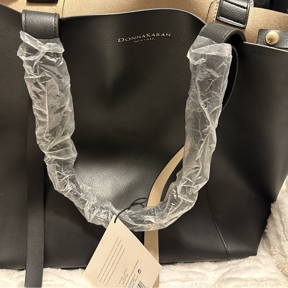 Donna Karan black tote. Made of PVC. Expandable.